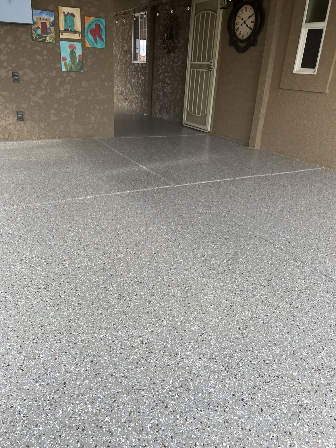 Carport floor with decorative flake coating