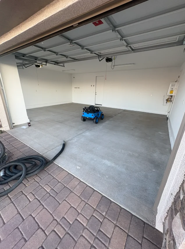 Custom garage cabinetry installation in a residential garage
